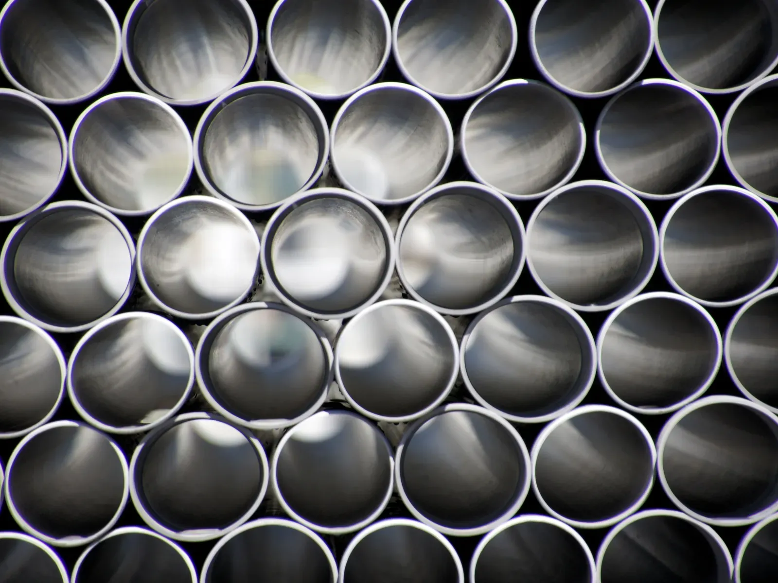 White PVC pipes stacked end-on